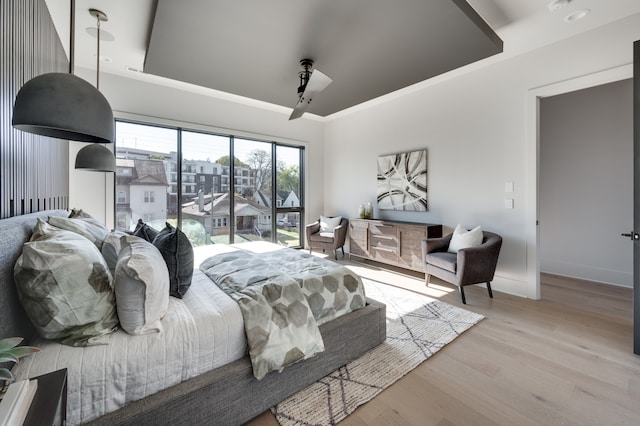 bedroom featuring light wood-type flooring