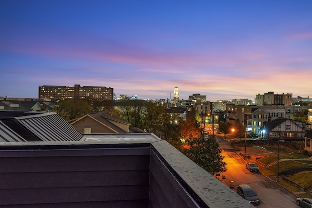 view of balcony at dusk