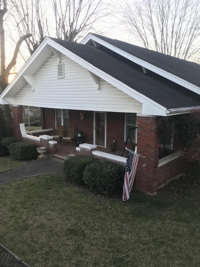 exterior space with a lawn