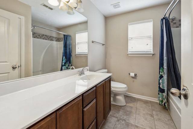 bathroom featuring vanity, tile patterned flooring, toilet, and curtained shower