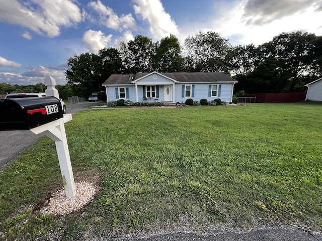 view of front facade with a front yard