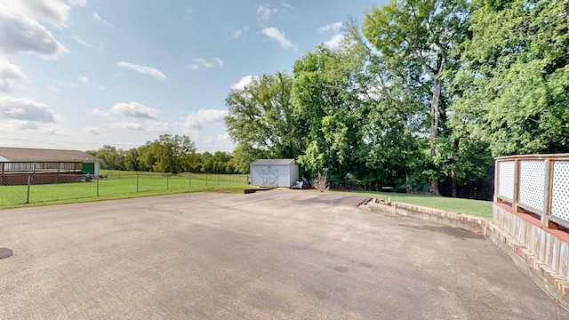 view of patio / terrace with a shed