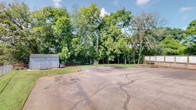 view of patio with a shed