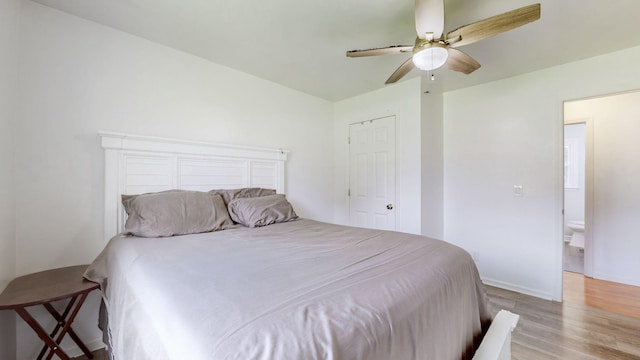 bedroom featuring light hardwood / wood-style floors and ceiling fan