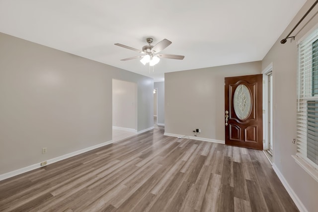 entrance foyer featuring ceiling fan and hardwood / wood-style floors