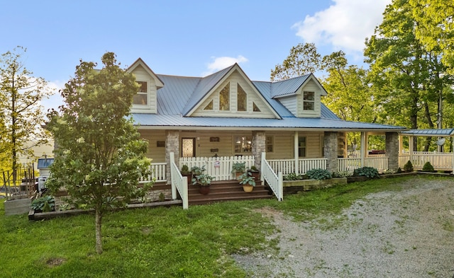 view of front of house featuring covered porch and metal roof