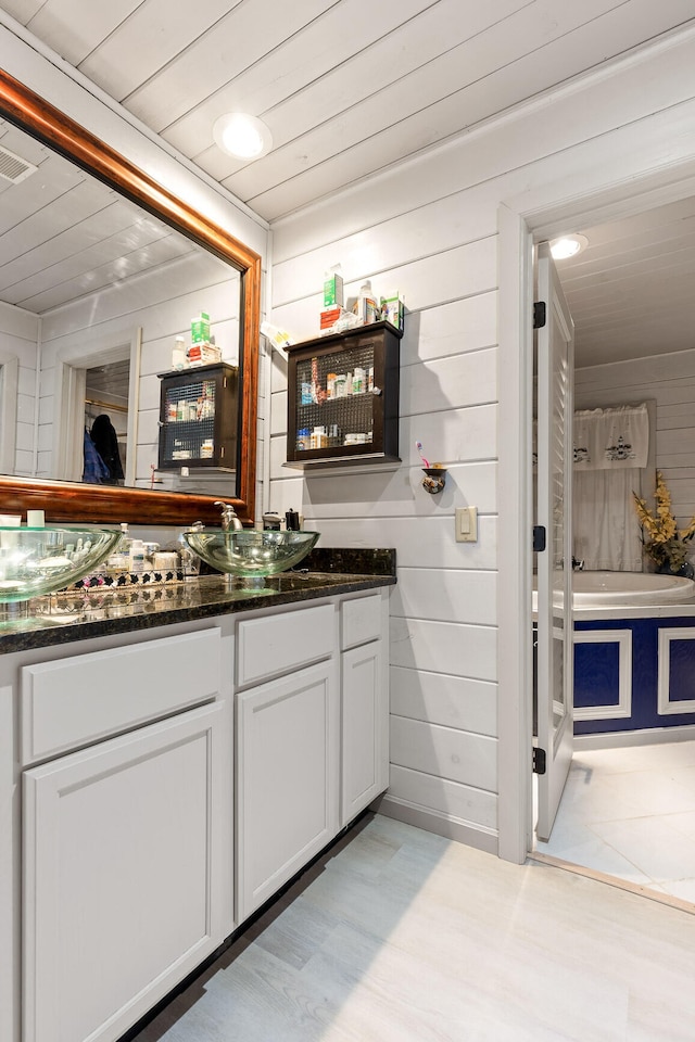 bar with wooden ceiling and a sink