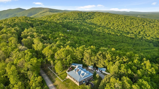 bird's eye view featuring a mountain view and a wooded view