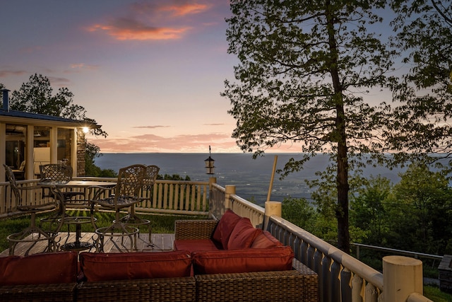 deck featuring a water view