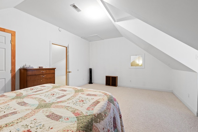 carpeted bedroom featuring lofted ceiling