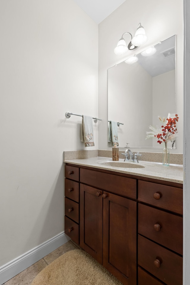 bathroom with vanity and tile patterned floors