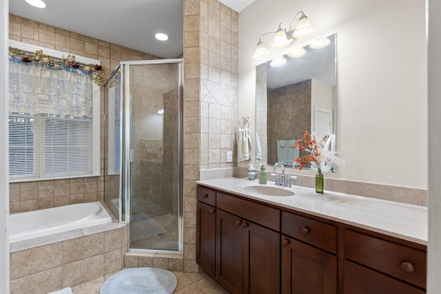 bathroom with vanity, separate shower and tub, and tile patterned floors