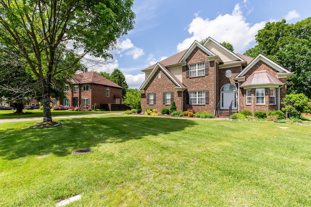 view of front of property with a front lawn