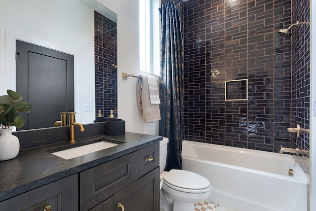 full bathroom featuring toilet, shower / tub combo with curtain, vanity, and tile patterned floors