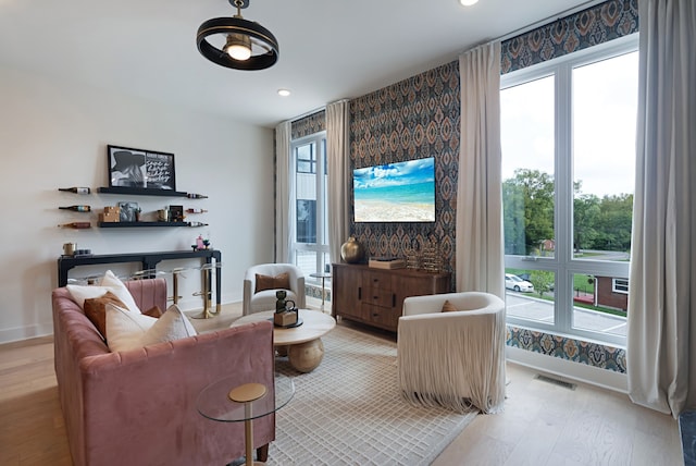 living room with light hardwood / wood-style floors