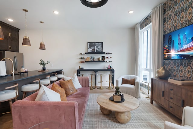 living room featuring sink