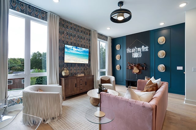 living room with light hardwood / wood-style flooring