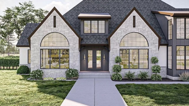 property entrance featuring a yard and french doors