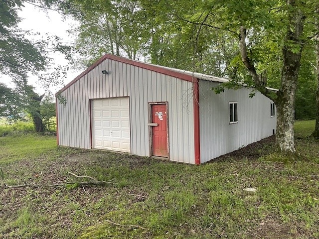 view of outbuilding with a garage