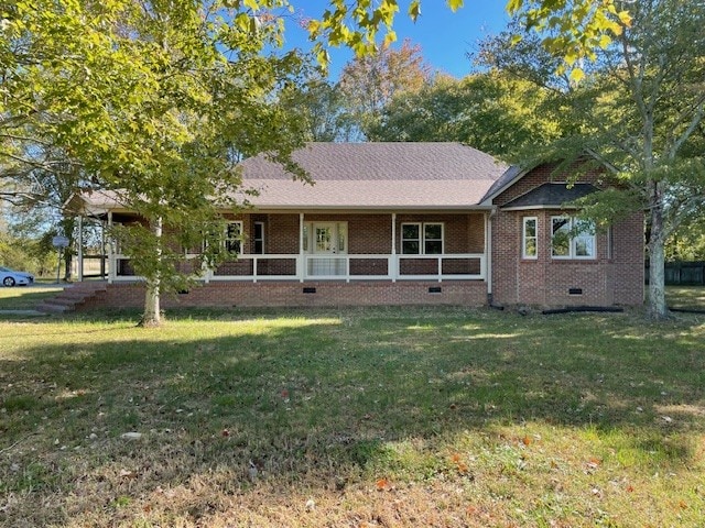 view of front of home with a front lawn