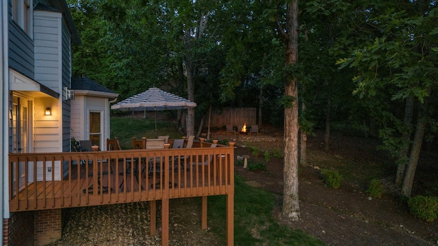 view of yard featuring a deck and a gazebo