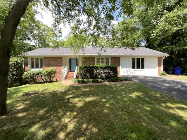 single story home with a front yard