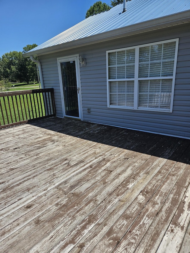 deck featuring a lawn