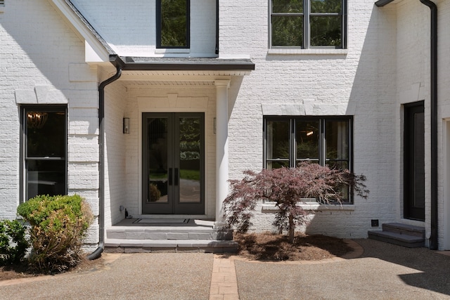 entrance to property featuring french doors