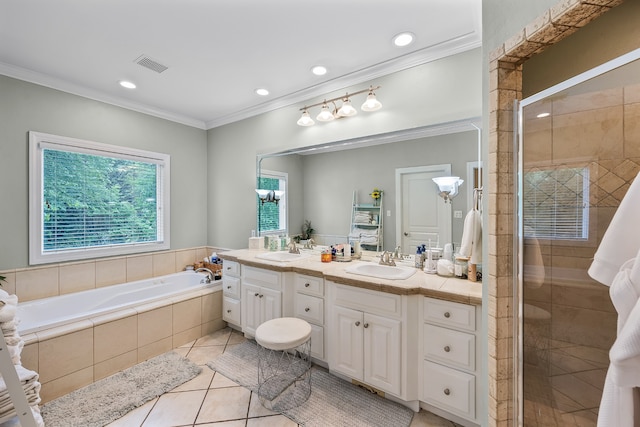 bathroom featuring crown molding, tile flooring, independent shower and bath, double sink, and oversized vanity