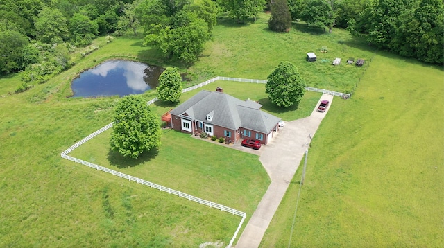 drone / aerial view with a rural view and a water view