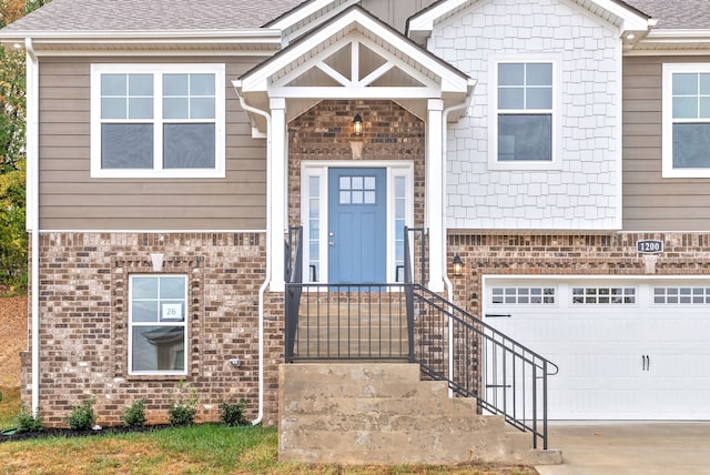 entrance to property featuring a garage