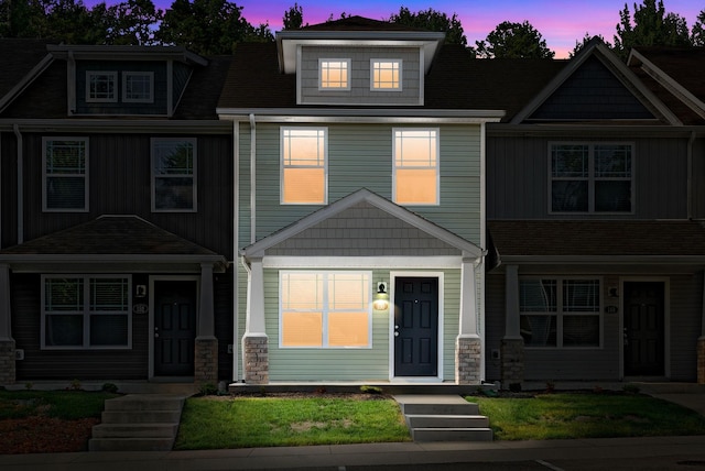 view of front of property with stone siding