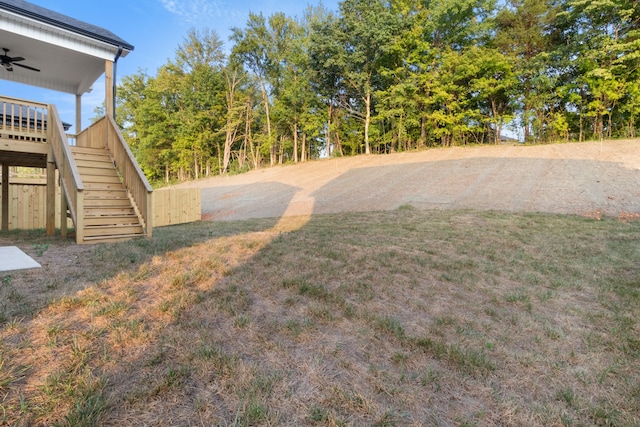 view of yard with ceiling fan