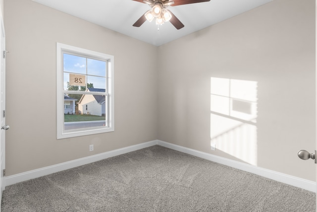 unfurnished room with carpet floors and ceiling fan