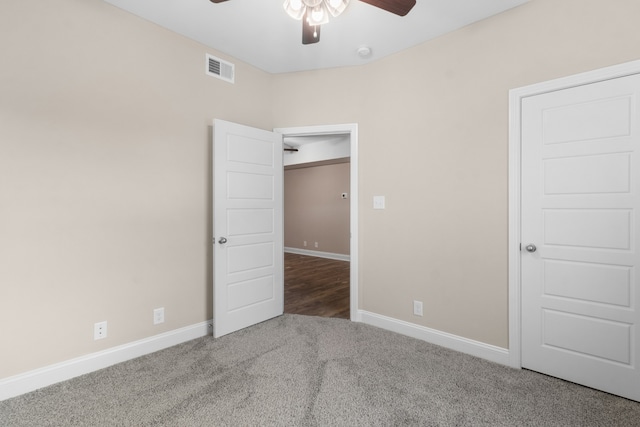 unfurnished bedroom with carpet and ceiling fan