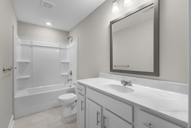 full bathroom featuring toilet, vanity,  shower combination, and tile patterned flooring