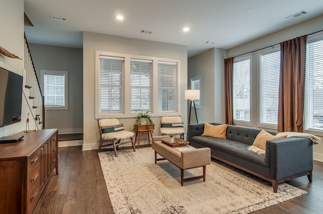 living room featuring dark hardwood / wood-style floors