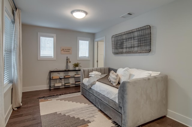 living area featuring dark hardwood / wood-style flooring