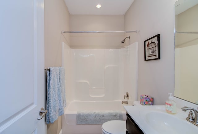 full bathroom with vanity, toilet, and shower / washtub combination