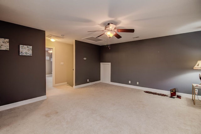 unfurnished room with light carpet and ceiling fan