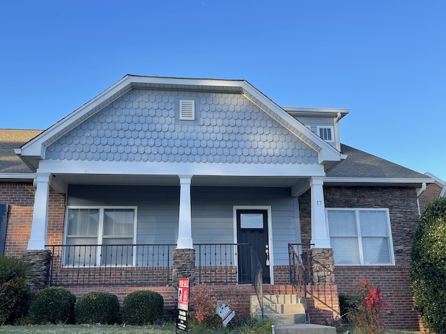 craftsman inspired home with a porch