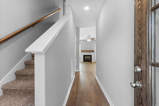 corridor featuring wood-type flooring