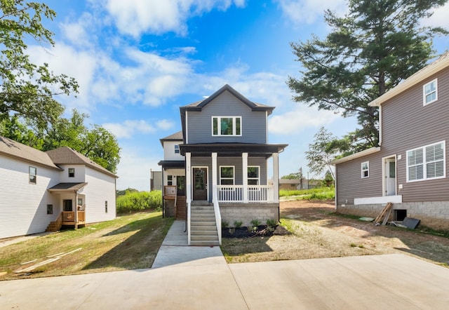 view of front of home featuring covered porch