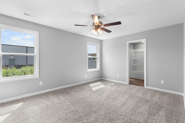 unfurnished bedroom with ceiling fan, carpet floors, and a closet