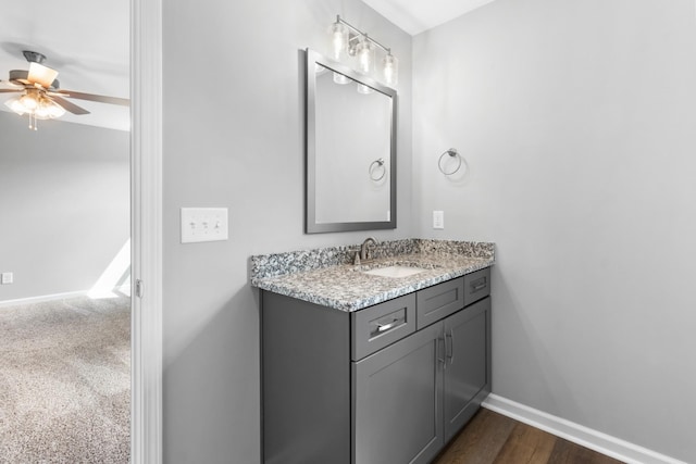 bathroom with vanity and ceiling fan