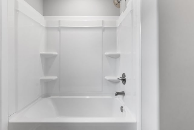 bathroom featuring shower / washtub combination