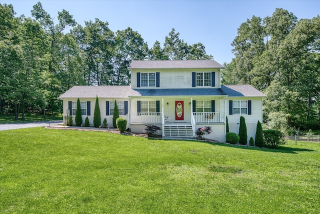 view of front of home with a front lawn and a porch