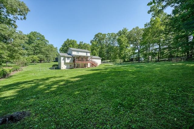 view of yard with a deck