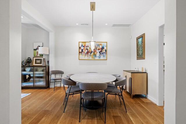 dining room featuring light hardwood / wood-style flooring