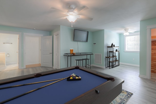 playroom featuring ceiling fan, light hardwood / wood-style floors, and pool table